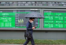 Asian stock markets stand firm amidst central bank actions and dollars pause